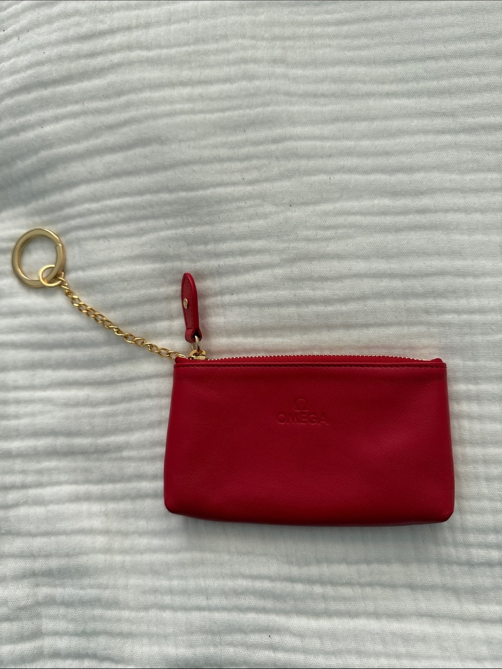 Omega Red Leather Zip Pouch with Gold Chain Keyring